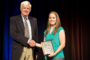 Mary Callahan receiving the Student Travel Scholarship Award Plaque